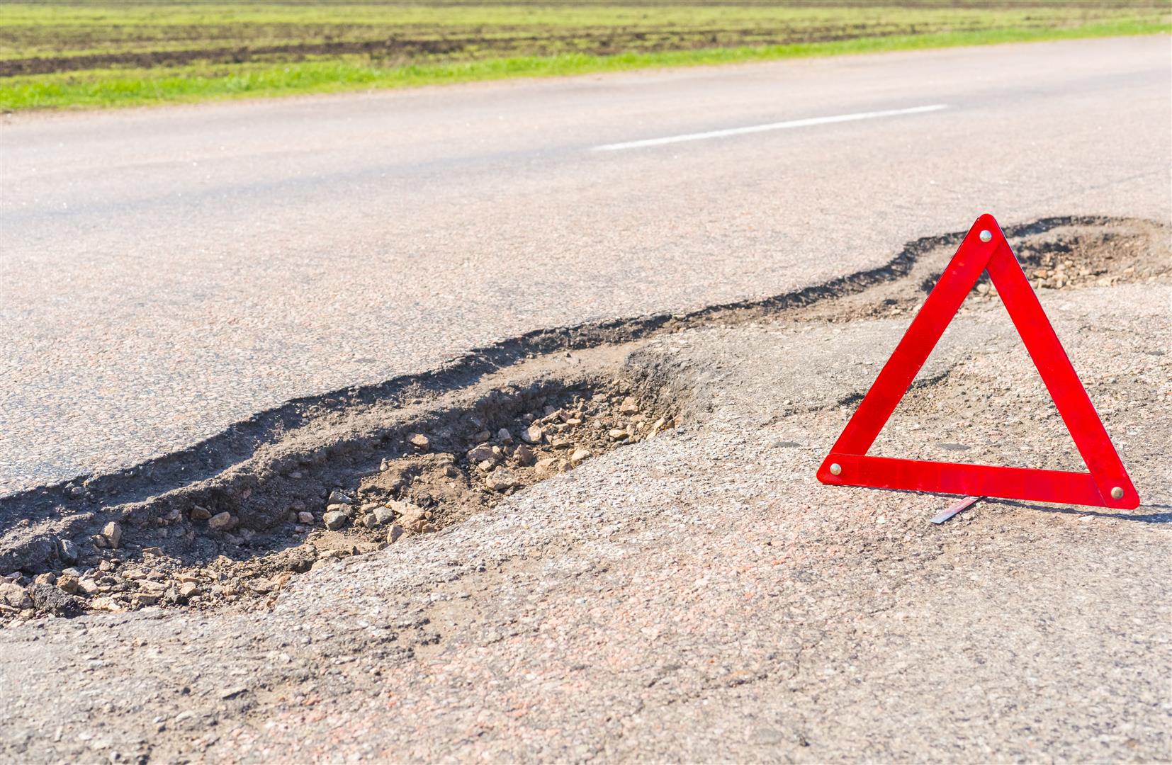 What to Do If You Hit a Pothole