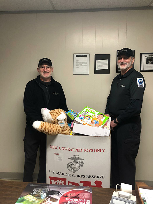 Mr. Transmission Owners Keep Friend’s Memory Alive Through Local Toys for Tots Drive